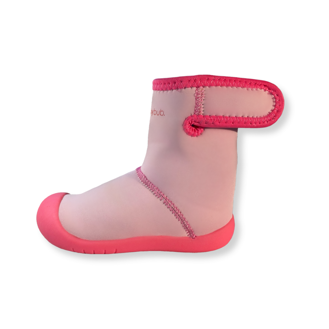 Pink Wee Wellies - still product photo on transparent background. Showing adjustable calf opening